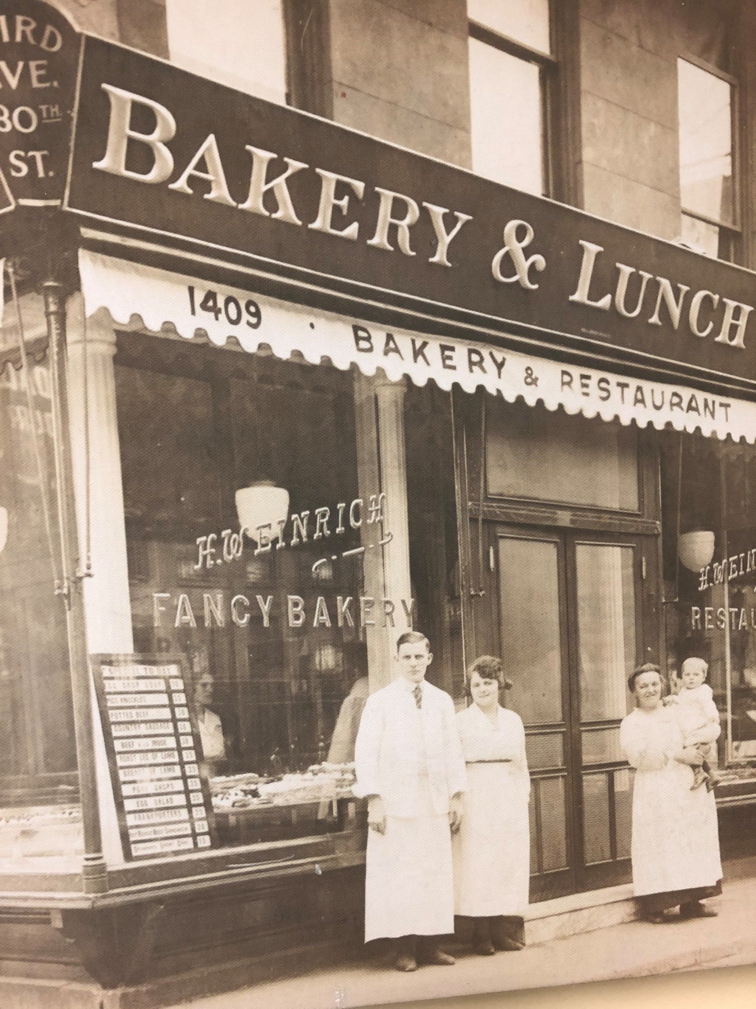 An old photo of a bakery and lunch.